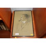 A framed and glazed portrait study of a man smokin