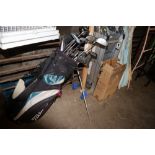 A Titleist golf bag with contents to include an Od