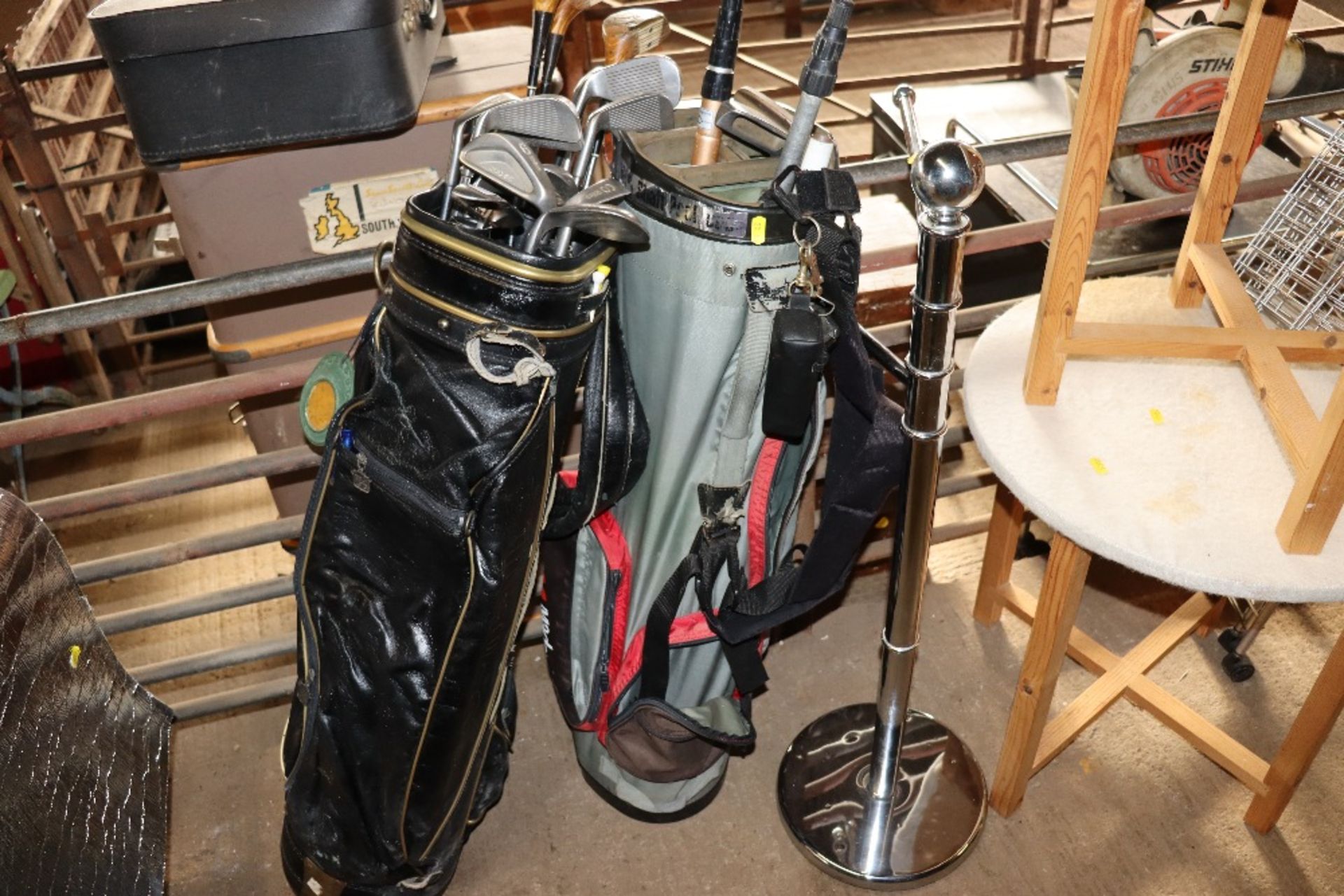 Two golf bags and contents of various clubs; to in