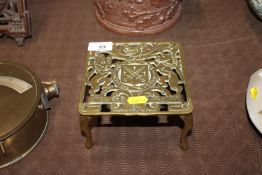 A brass trivet