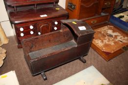 An antique miniature rocking crib, approx. 32cm x