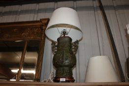 A Chinese bronze archaic style Hu vase with raised