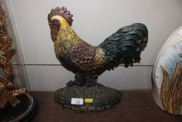 A door stop in the form of a cockerel