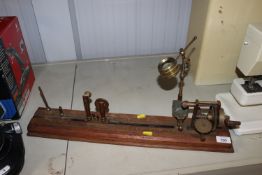 A vintage brass yarn twist tester, by J.H. Heal Ha
