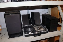 A Sanyo stereo music centre and a pair of Aiwa spe