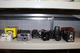 A quantity of cameras to include a Zenit TTL, the