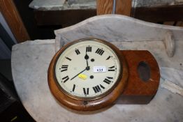 A cased two hole style school clock (battery opera