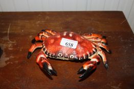 A storage box in the form of a crab (93)