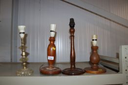 Three wooden table lamps and one other