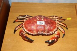 A storage box in the form of a crab (92)