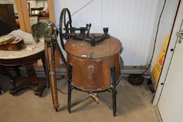 A large vintage copper washing machine