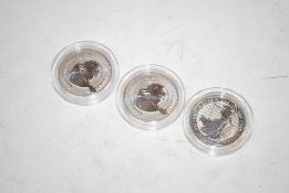 A 2023 fine silver 1oz Britannia and two 2024 fine