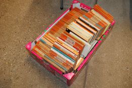 A box of various vintage and other Penguin books