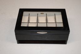 A watch box (lacking drawer)
