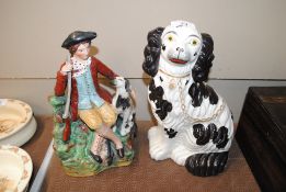 A 19th Century Staffordshire spaniel and a Staffor