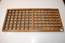 A wooden printers tray