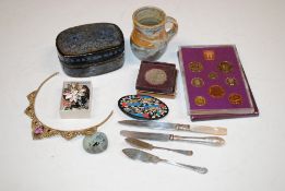 A box containing 1970 Coinage of Great Britain and Northern Ireland set; a 1951 crown; a pottery