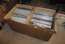 Two boxes of various LP's to include Charlie Parker, The Beatles 'Revolver', The Beatles 'Help', The