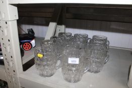 A quantity of glass beer steins