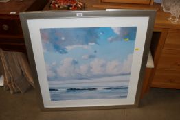 A modern framed coloured print depicting a seascap