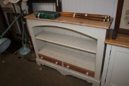 A stripped pine and part painted open fronted book