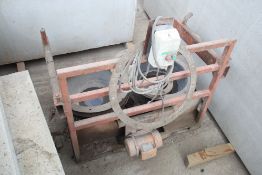 Frame containing two moulds for casting concrete c