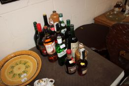 Various bottles of alcohol to include whisky, cogn