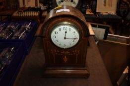 An Edwardian inlaid mahogany mantel timepiece