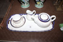 A continental porcelain bachelor's tea set on tray