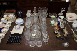 A collection of various glassware including vases,