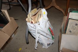 A bag of miscellaneous old newspapers and maps