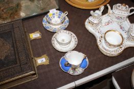 Three decorative 19th Century cups and saucers