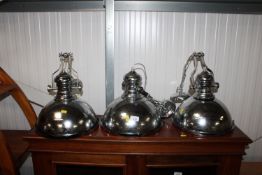 Three pendent light fittings