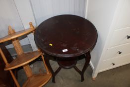 A circular, two tier occasional table