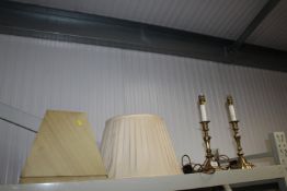 A pair of brass table lamps and various shades