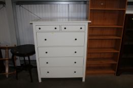 A modern white chest fitted two short over four lo