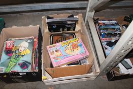A box containing Solitaire boards, Boules etc.