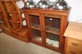 A stained pine display cabinet