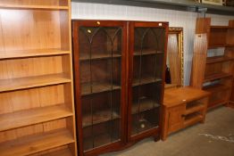 An oak leaded glazed display cabinet