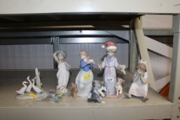 A quantity of various Lladro figurines and ornamen