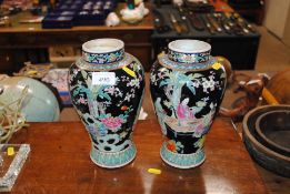 A pair of Japanese famille rose baluster vases