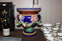 A large Minton Majolica ware jardiniere with lion