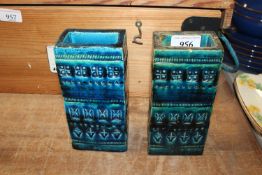 A near pair of blue glazed pottery vases in the st
