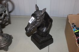 A cast iron horse head bust (67)