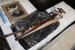Two briefcases; a quantity of walking sticks and a
