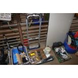 An Einhell sack barrow and a box containing door h