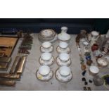 A quantity of Royal Albert gilt and floral pattern