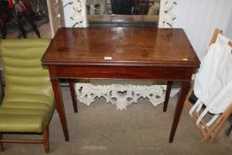 A Victorian mahogany tea table