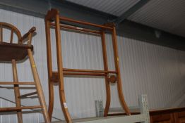 An oak towel rail