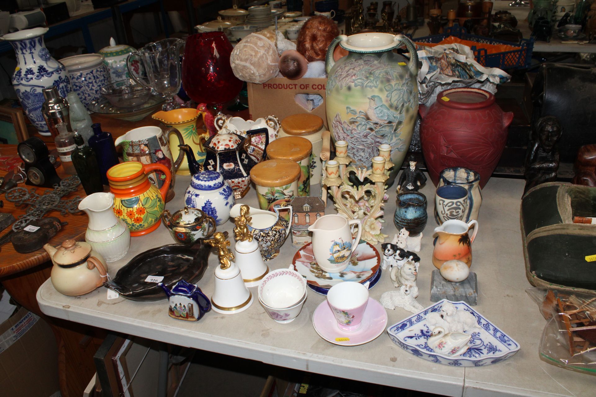 A quantity of various decorative items to include a Burleigh ware bird decorated jug; Beswick jug; a